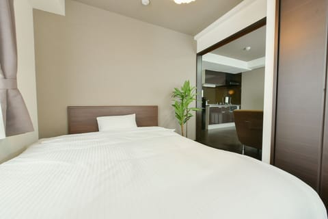 Family Apartment | 1 bedroom, iron/ironing board, free WiFi, bed sheets