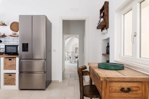 Villa | Private kitchen | Fridge, microwave, oven, stovetop