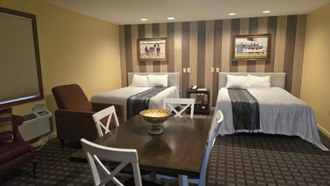 Family Studio Suite, 2 Queen Beds | Desk, blackout drapes, iron/ironing board, free WiFi
