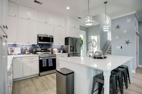 Kitchen with oversized island perfect for entertaining