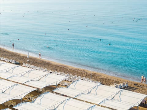Private beach nearby, free beach shuttle, sun loungers, beach umbrellas