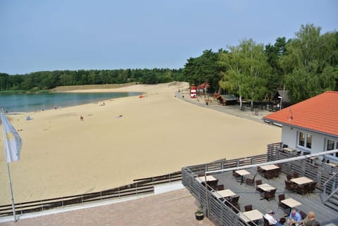 On the beach, white sand, water skiing, beach volleyball