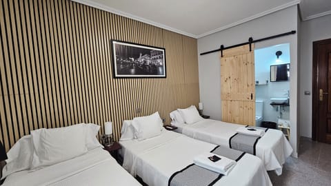 Family Room (3 people) | Desk, blackout drapes, iron/ironing board, free WiFi