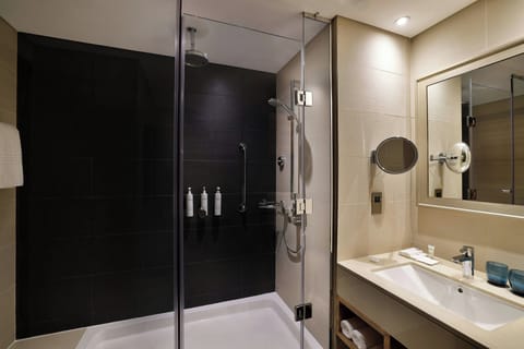 Suite, 1 Bedroom | Bathroom | Free toiletries, hair dryer, bathrobes, slippers