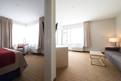 Suite, 1 King Bed with Sofa bed, Non Smoking (Upgrade) | Desk, blackout drapes, iron/ironing board, rollaway beds