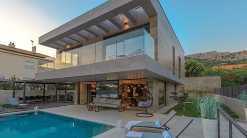 View of the luxury villa Krk Baska II with heated pool and outdoor terrace in Baška on the island of Krk