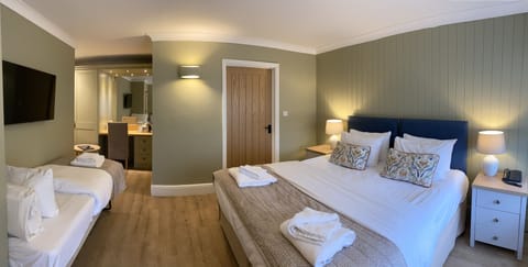 Family Triple Room | Iron/ironing board, free WiFi, bed sheets