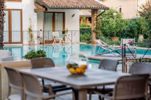 Seasonal outdoor pool, pool umbrellas, sun loungers