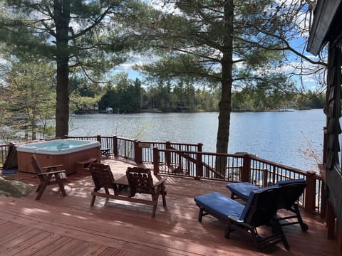 Large deck area with hot tub