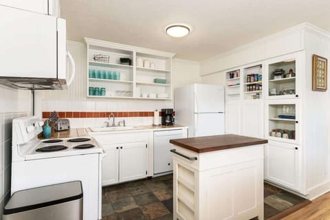 A classic cottage kitchen that's been updated and fully stocked for any meal.