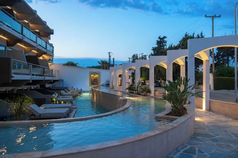 Outdoor pool, pool umbrellas, sun loungers