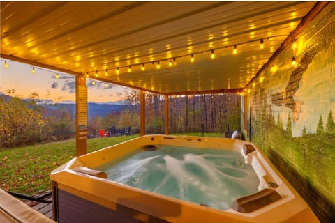 Sunset soak with mountain views — unwind in your private hot tub.