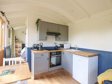 Fridge, electric kettle, toaster, cookware/dishes/utensils