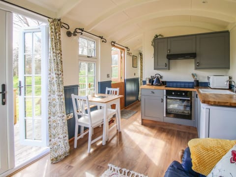 Fridge, electric kettle, toaster, cookware/dishes/utensils