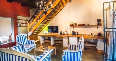 Luxury Apartment | Living area | 42-inch LED TV with satellite channels, TV