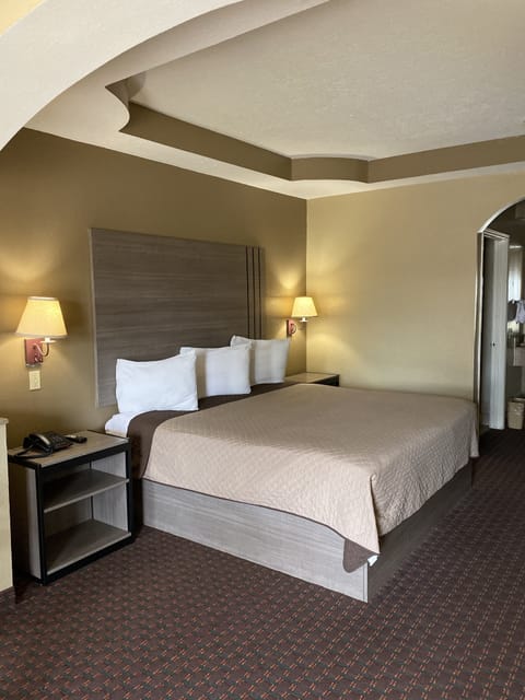Blackout drapes, iron/ironing board, free WiFi, bed sheets
