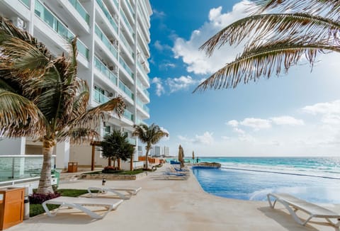 2 outdoor pools, pool umbrellas, sun loungers