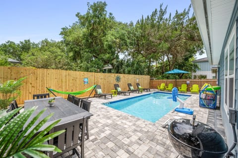 Dine Al Fresco! Take a break from the pool and gather your family around the outdoor 8-seat dining table for a memorable meal.