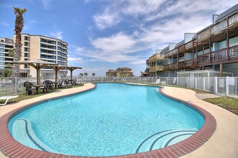 Dive into crystal-clear waters surrounded by colorful beach houses and swaying palms, where your perfect coastal getaway awaits under endless blue skies.