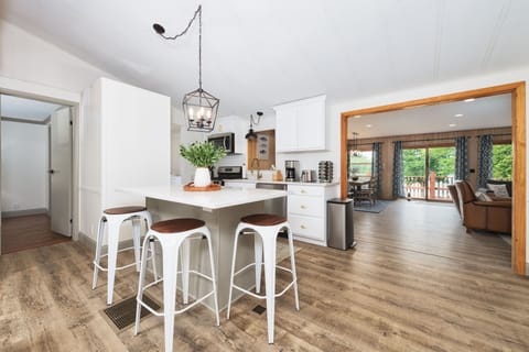 Updated kitchen with an island seating area. 