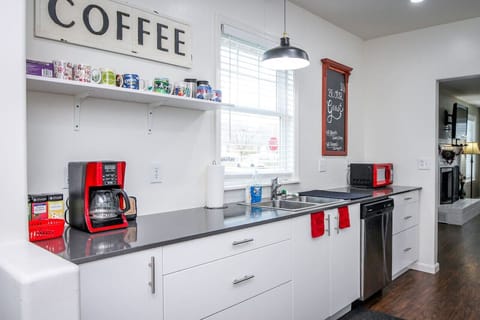 Cute vintage galley kitchen! Newly remodeled with brand new cabinets, counters, and appliances.