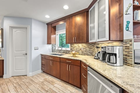 Start your mornings effortlessly at the coffee station, complete with regular and Keurig brewers, ready for your first sip by sunlit windows.