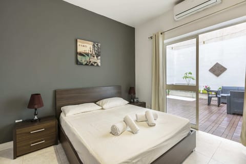 Basic Apartment, Multiple Beds | 2 bedrooms, iron/ironing board, bed sheets