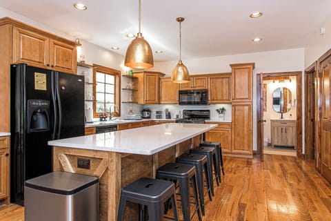 Ample space in the kitchen for the cook in the family or for group cooking. Island ideal for gathering or quick breakfast.