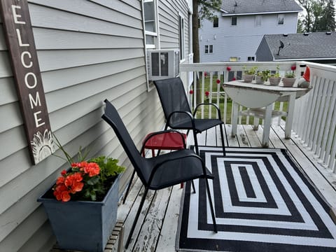South facing deck that greets you upon arrival.  Fresh grown herbs to enjoy!