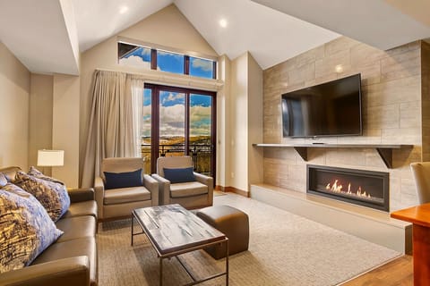 Spacious living room with cozy gas fireplace