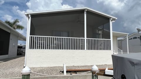 Large screened porch overlooking the canal and dock 