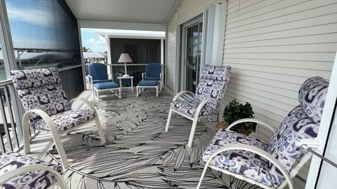 Screened patio area perfect for relaxing 