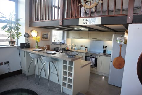 Fridge, electric kettle, toaster, cookware/dishes/utensils