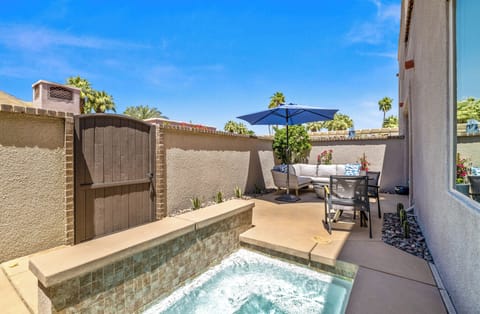 Private courtyard with plunge pool, fire pit, and outdoor dining
