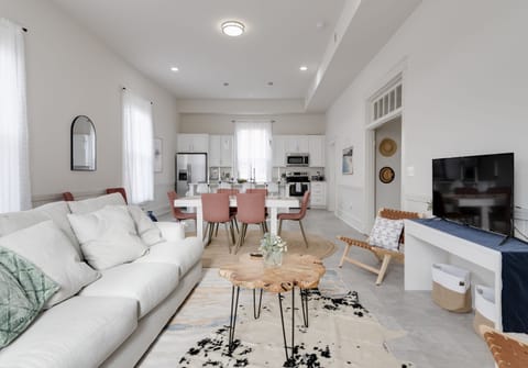 Open concept living room and kitchen allows family and friends to stay together to socialize and reconnect.