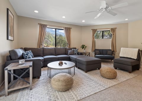 After a long day of exploring & hiking, watch 70" 4K TV under AC & ceiling fan 