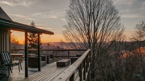 Enjoy scenic views from your expansive deck--fully equipped w/ outdoor seating