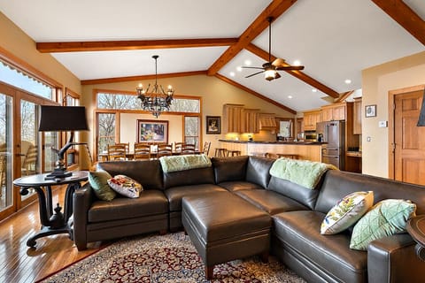 Great Room with Vaulted Ceilings and Exposed Beams
