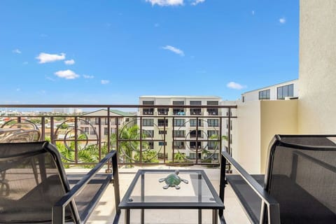 Embrace the island life, one sunset at a time, from our Palm Aruba Condo balcony – where time stands still.