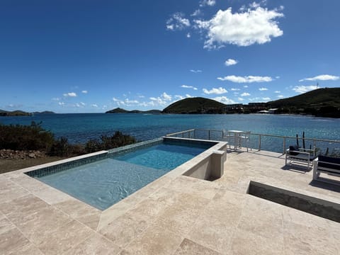 Newly added pool over looks the Caribbean Sea
