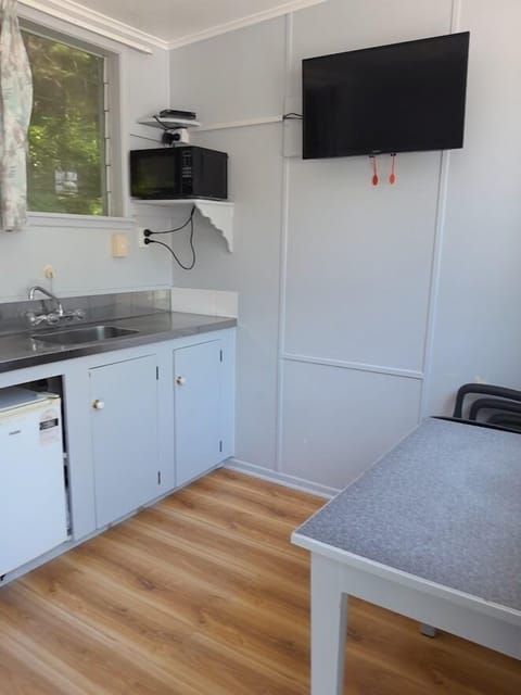 Traditional Cabin | Private kitchenette | Mini-fridge, microwave, toaster, highchair