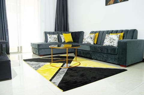 Deluxe Apartment | Living area | 42-inch flat-screen TV with digital channels, TV