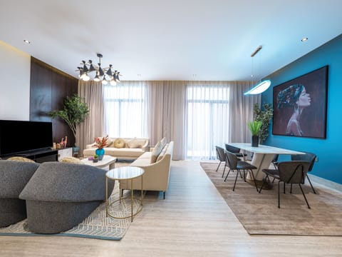 Apartment, 3 Bedrooms | Living area | 55-inch LCD TV with digital channels, TV