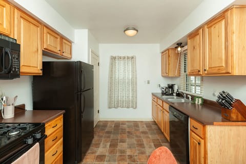 Fully stocked w/ all the basic cooking & baking gadgets you'll need.