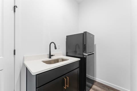 More snacks? More drinks? This extra fridge and sink upstairs has you covered.