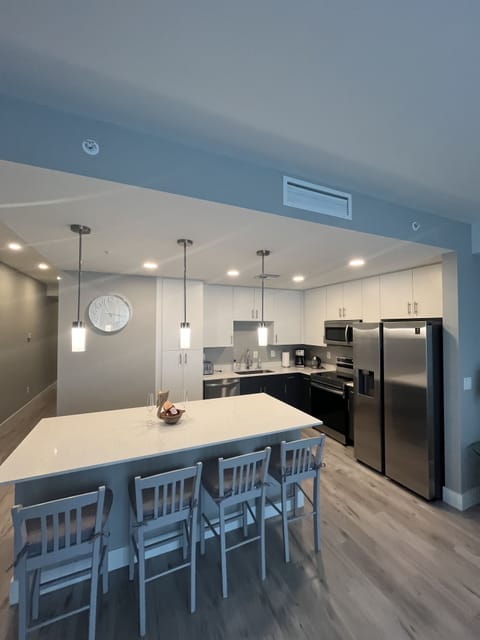Great kitchen with an island that seats four. 