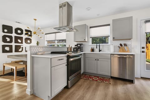 Whip up delicious meals effortlessly with modern appliances and ample counter space.