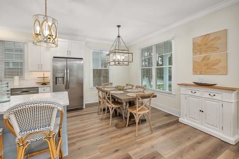 The dining room has available seating for 6 and additional seating for 3 at the countertop