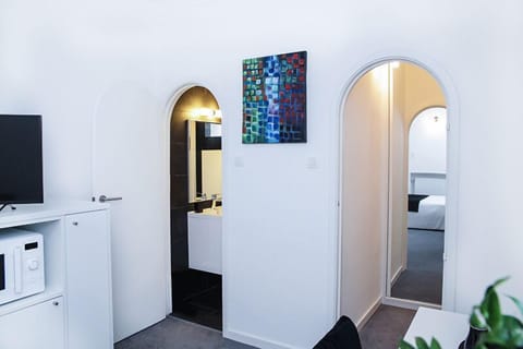 26-inch flat-screen TV with cable channels, TV