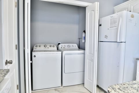 Washer and dryer upstairs .
